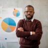 front-view-man-doing-presentation-during-meeting_23-2148817046